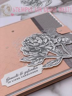 a close up of a card with flowers on it