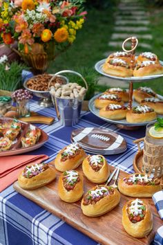 a table topped with lots of food covered in toppings