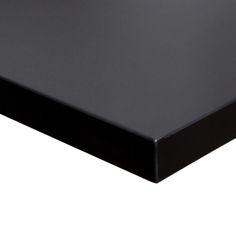 a black plastic table top on a white background