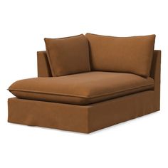 a brown chaise lounger with pillows on it's back and the seat folded down