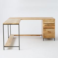 a wooden desk with two drawers and a shelf underneath it, against a white background