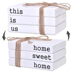 three white books tied with twine and labeled this is us, home sweet home