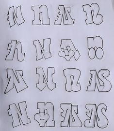 the letters and numbers are drawn on paper