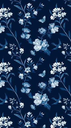 a blue and white floral pattern on a dark background with leaves, flowers, and buds