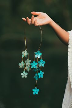 A dramatic cascade of verdant blossoms float from a hand hammered band for a stunning dose of bohemian glamour. All brass construction with natural verdigris patina. Nickel and lead free. Jewelry Inspired By Nature, Bohemian Green Jewelry With Flower Decoration, Bohemian Glamour, Trash Fashion, Metal Art Jewelry, Boho Jewelry Diy, 2024 Inspiration, Beach Jewelry Boho, Bold Statement Jewelry