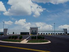 an empty parking lot in front of a building