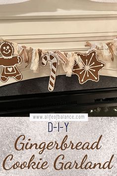 gingerbread cookie garland hanging on the mantle with text overlay reading diy gingerbread cookie garland