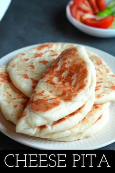 Cheese stuffed flatbread or cheese pita bread is one of the most delicious flatbreads that we can make at home in a simple way.

We use simple ingredients, simple method and the resulting bread is extremely good!

This homemade cheese stuffed bread is super soft and tender.It has a chewy texture and is deliciously filled with cheese. Pita Bread Fillings, Bread Stuffed With Cheese, Cheese Kolache Recipe, Cream Cheese Kolache Recipe, Soft Flatbread Recipe, Cheese Pita, Breakfast Pita, Kolache Recipe