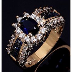 Gender:Women's; Gemstone:AAA Cubic Zirconia; What's in the box:1 Women's Ring; Gemstone Color:Red,Blue; Quantity:1pc; Style:Stylish; Jewelry Type:Ring; Occasion:Gift,Work,Christmas,Daily,Wedding; Material:18K Gold,Alloy; Features:Cute; Front page:WE; Shipping Weight:0.018; Package Dimensions:5.05.03.5; Net Weight:0.005; Listing Date:11/09/2021; Size chart date source:Provided by Supplier. Gold Color Ring, Wedding Ring Sizes, Couple Jewelry, Jewelry Wedding Rings, Red Diamond, Gold Filled Ring, Zircon Ring, Unisex Jewelry, Red Crystals