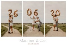 a man and woman holding balloons in the air while standing on a dirt road with their arms around each other