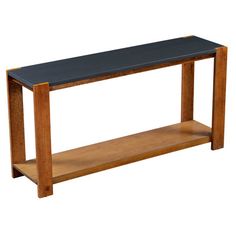 a wooden table with a black top and shelf