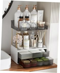 a bathroom shelf filled with lots of different items