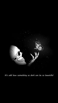 a black and white photo with a skeleton holding a butterfly in it's hand