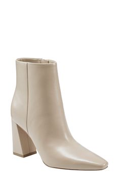 Boasting a clean-lined, sleek silhouette with a modern square toe and tapered block heel, this versatile leather bootie is a go-to cool-weather look. 3 1/2" heel(size 8.5) 4 3/4" shaft Leather upper/synthetic lining and sole Imported Taupe Ankle Boots, Cream Boots, Modern Square, Marc Fisher, Shoes Booties, Leather Booties, Natural Leather, Ankle Booties, Bootie