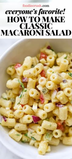 a white bowl filled with macaroni salad