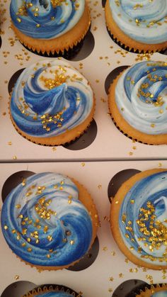 blue and white cupcakes with gold sprinkles