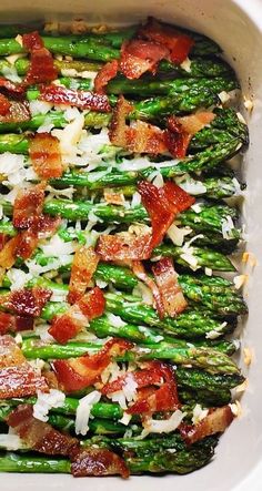 asparagus with bacon and parmesan cheese in a casserole dish