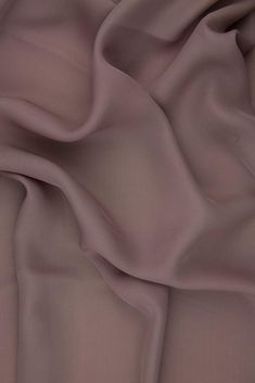 Mauve Taupe Silk Double Georgette Fabric is a remarkably durable, lightweight premium silk that offers an extremely graceful drape and a soft, dull finish. This fabric is ideal for blouses, gowns, dresses, and overlays. The fabric's soft, airy appearance also makes it suitable for scarves and other accessories. The fabric is sold by the Yard, and measures 44 inches in width. Mauve Taupe, Dupioni Silk, Mauve Color, Georgette Fabric, Silk Wool, Pink Fabric, Wool Fabric, Silk Fabric, Beautiful Fabric