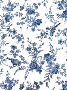 blue and white floral wallpaper with birds on it