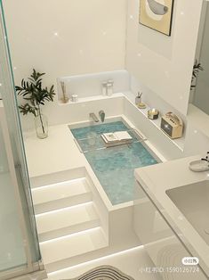 a bathroom with a sink, bathtub and shower stall in the middle of it