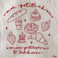 a white towel with red thread on it and embroidered words that read, mr peter's bakery