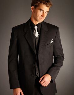 Minus pinstripes. groomsmen w/ blue ties, Oliver w/ white. =D 3 piece black suit with black shirt - Google Search Black Suit Black Shirt, All Black Tux, Men Fashion Suit, Black Suit Vest, All Black Suit, Black Pinstripe Suit, Silver Tie, Black Tux, Black Tie Dress