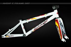 a white and red bike frame on a black background with the words, team name