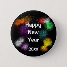 a happy new year badge with colorful fireworks on the black backgrounnd button