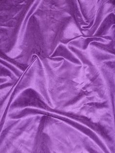 a purple sheet that is laying on the ground