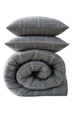 three pillows stacked on top of each other