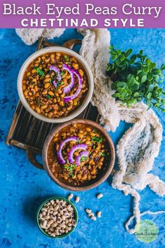 two bowls filled with black eyed peas curry next to some beans and herbs on a blue surface