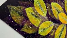 a painting with yellow leaves on it