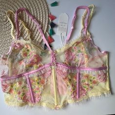 For Love And Lemons Floral Frenzy Bustier Pastel Yellow Small New Condition: New In Package Size: Small Color: Pastel Multi-Color This Fresh-As-A-Daisy Design Features Scalloped Lace Trim, Double Scrunchy Satin Straps, And A Crystal Flower Button Front And Center. Wear In Or Out. Wireless Unlined Double Adjustable Straps Back Hook And Eye Closures Scalloped Lace Trim Crystal Flower Buttons Tulle Ruffles Machine Wash Imported F2195a Pink Sheer Bra For Spring, Sheer Pink Bra For Spring, Sheer Party Bra For Spring, Spring Sheer Pink Bra, Sheer Bra For Party In Spring, Fairy Fits, Mermaid Clothing, Pinup Photoshoot, Tulle Ruffles