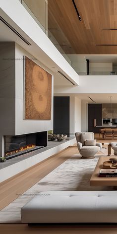 a living room with couches, chairs and a fire place in the middle of it