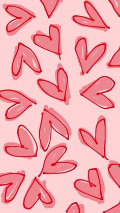 hearts drawn in red on a pink background