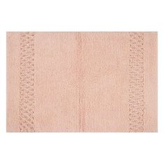 a pink rug with braiding on the side