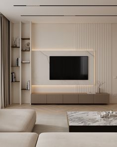 a modern living room with white furniture and a flat screen tv mounted on the wall