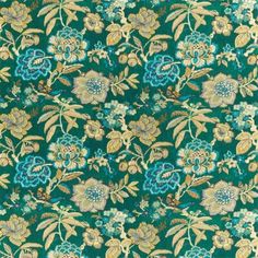 a green and blue floral pattern on fabric