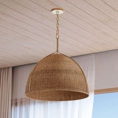 a light fixture hanging from the ceiling in a room