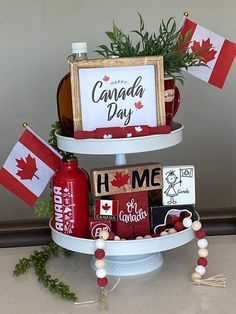 two tiered tray with canada day items on it