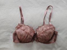 A NWT old stock Vintage Bra from Japan, in size 12B/Aus, 34B/UK and 34B/US, (D75 Japan) (see sizing chart in pictures) in a Mocha net and lace finish with contrasting underlay. Underwired with elasticised and adjustable straps and double clasp with removable padded cups. Has matching satin bow between cups. Colour - Mocha Vintage Bra, Bra Items, Bra Lingerie, Mocha, Festival Season, Favorite Outfit, Bra, Satin, Japan