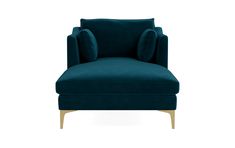 an upholstered blue chair with gold legs