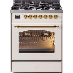 a white stove top oven with two burners and gold trimmings on the front