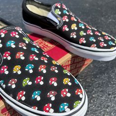 Check out our cute mushy mushroom custom design on Black Slip On Vans. This pattern of cute and kawaii mushrooms have a theme of autumn fall color on the tops of these slip on vans shoes. We buy each pair of shoes BRAND NEW. Each pair is made to order, please make sure you put in the correct shoe size before you check out. The ink is permanent and will never come off, fade away, or peel off. Made in the USA. This price includes everything: shoes, artwork, and shipping. Thanks for stopping by our Vans Art Shoes, Mushroom Vans, Easy Shoe Painting Ideas, Custom Painted Shoes Vans, Shoe Painting Ideas Vans, Mushroom Shoes, Custom Vans Slip On, Custom Slip On Vans, Mushroom Autumn