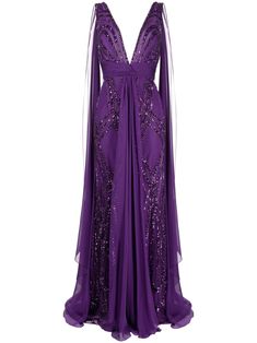 amaranth purple silk blend chiffon bead embellishment sequin embellishment plunging V-neck concealed rear zip fastening scoop back sleeveless fitted waistline elongated back panels floor-length silk lining Purple Formal Dress, Grammy Dresses, Gown Purple, Cold Shoulder Gown, Evening Dress Beaded, Bead Embellishment, Beaded Chiffon, Beaded Gown, Silk Gown