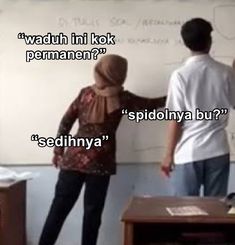 two people standing in front of a whiteboard with the words'waduh ni ko permanen? '