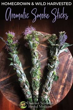 some flowers are tied together on a wooden board