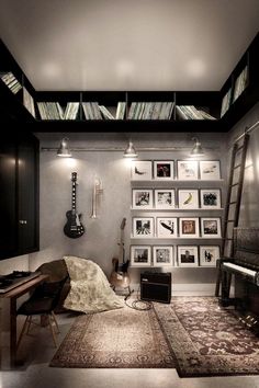 a living room filled with furniture and bookshelves next to a piano in front of a window