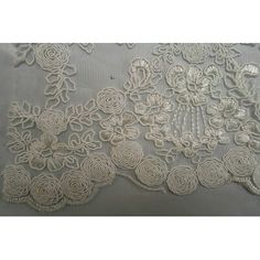 white lace with flowers on it