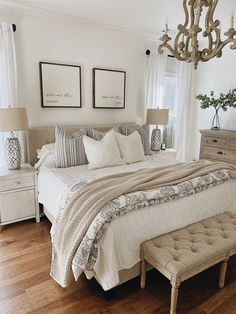 a bedroom with white walls and wood flooring is featured in the instagramt